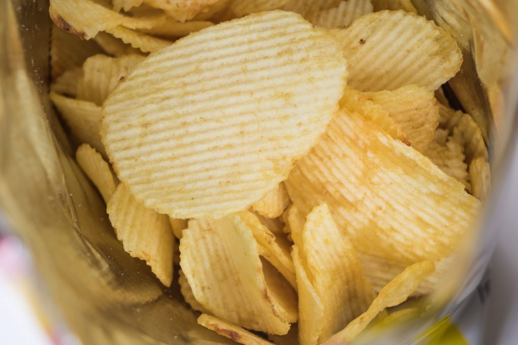 chips inside of their bag ready to be eaten